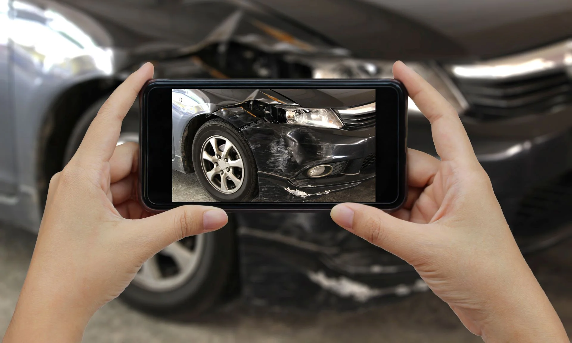 A car accident victim documenting evidence for her insurance claim.